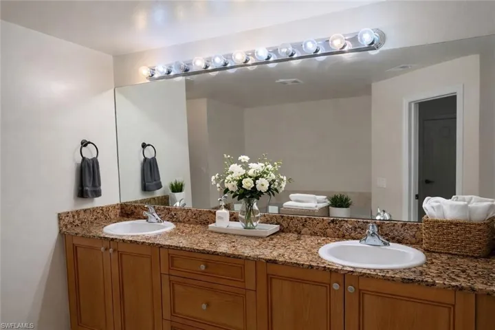 Full bathroom with double vanity