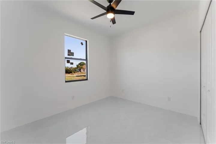 Spare room featuring ceiling fan