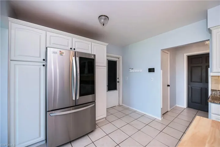 Kitchen features lots of cabinets