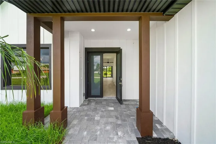Entrance to property with a porch
