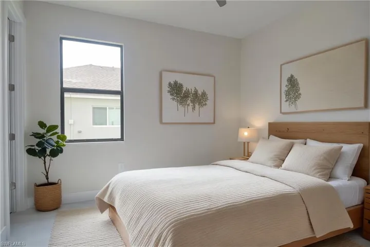 Bedroom with baseboards and ceiling fan