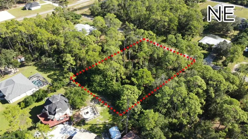 Aerial overview of property's location featuring property parcel outlined