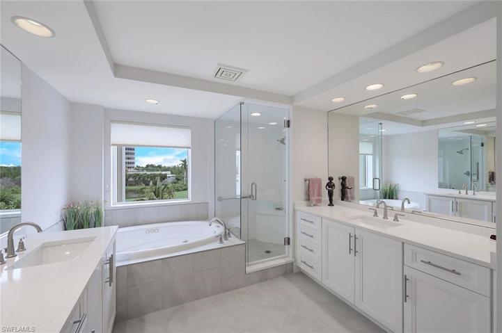Soaking tub in the primary bath beckons you; sip a glass of wine while relaxing in the tub.
