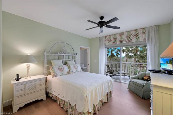Guest bedroom privately tucked away from primary with en suite bathroom.