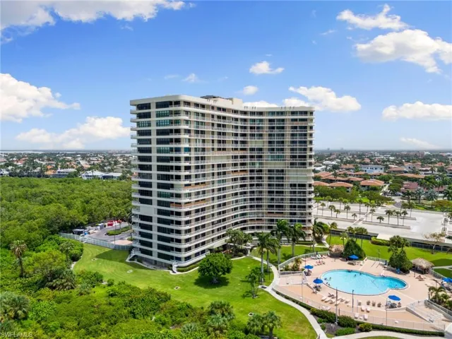 View of property featuring a community pool