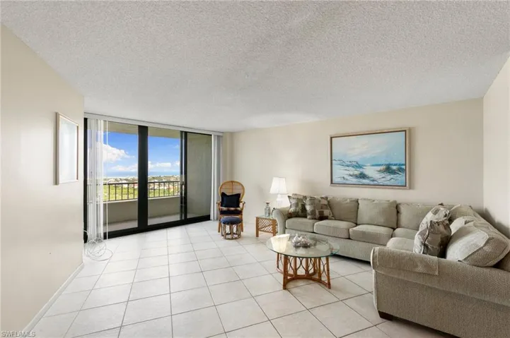 Living room with gulf view and balcony