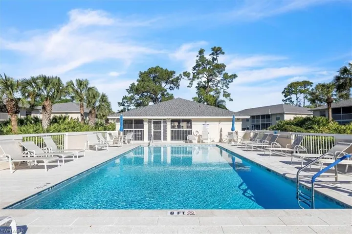 Community pool featuring a patio area