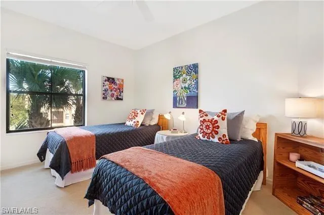 Bedroom featuring carpet flooring and a ceiling fan