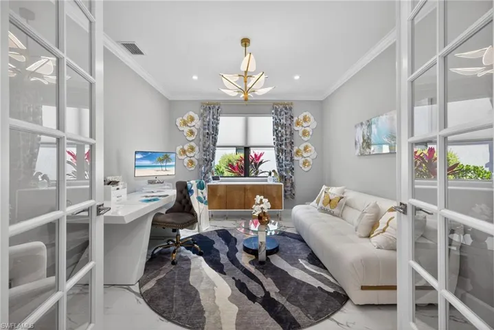 Office space with crown molding, recessed lighting, and french doors