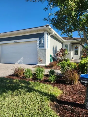 Single story home featuring a garage