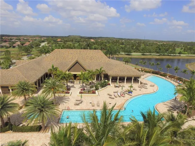 View of pool featuring a water view and a patio