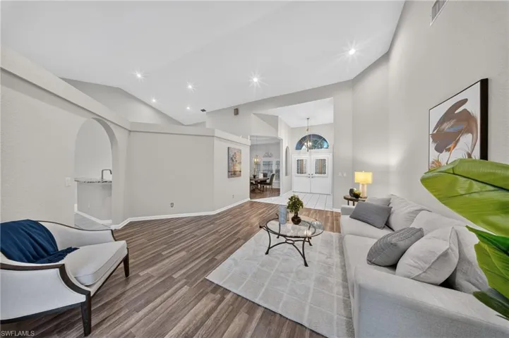 Volume ceilings and an open, light-filled floor plan throughout the main living area.