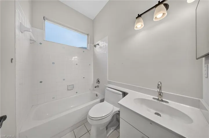 Refreshed full guest bath with tub/shower combo and updated fixtures.