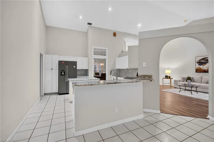 The kitchen opens directly to the main living space — made for entertaining.