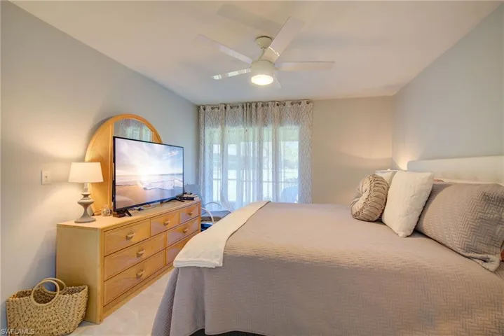 Bedroom featuring a ceiling fan