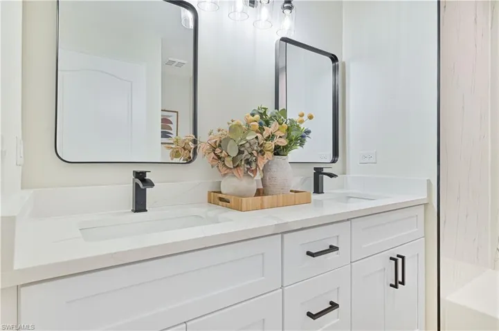 guest bathroom with double sink