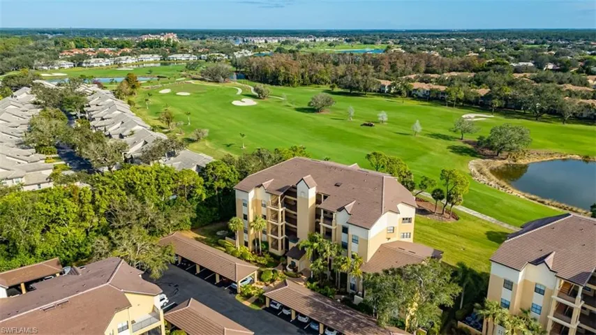 Bird's eye view of a nearby body of water and a golf course