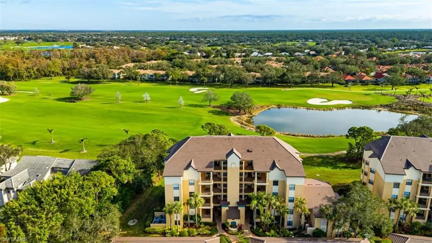 Bird's eye view of a nearby body of water and a golf club
