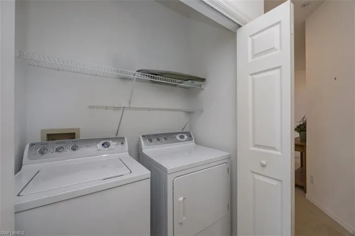 Laundry room with washing machine and dryer