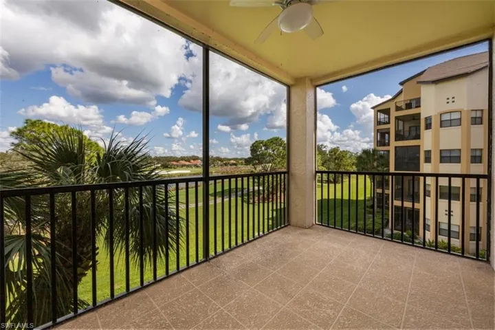 Balcony featuring a ceiling fan