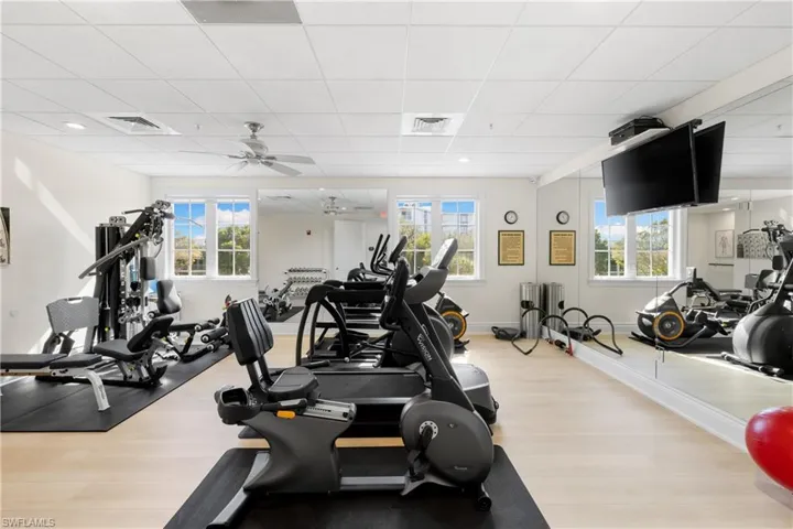 Recessed lighting illuminates a tray ceiling