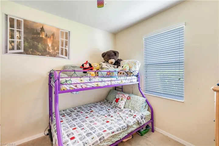 Bedroom featuring carpet