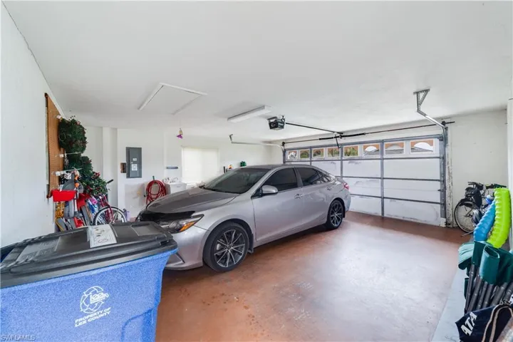 22'X 22' 2-CAR GARAGE w/utility sink. pull down attic stairs.