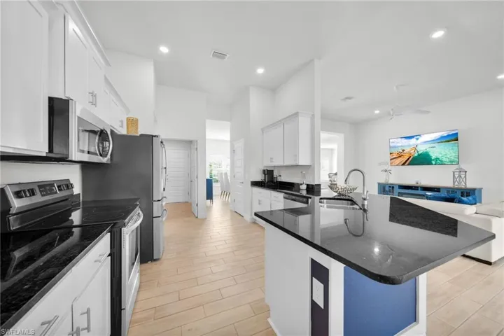 Kitchen and breakfast bar. Open floor plan