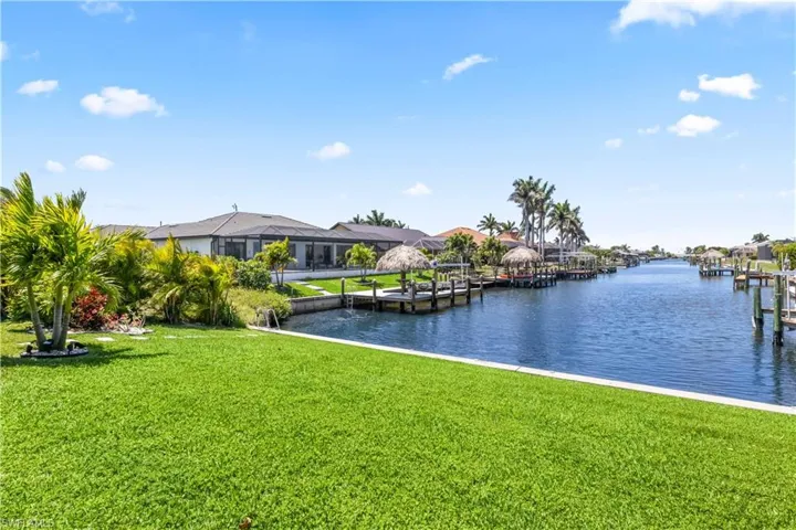 Water view with a dock and a residential view
