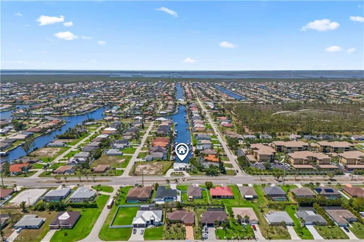 Bird's eye view with a residential view and a water view