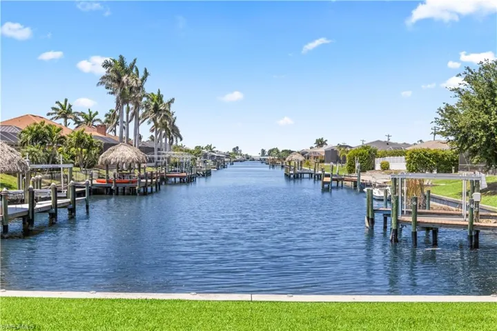 View of dock featuring a water view and boat lift