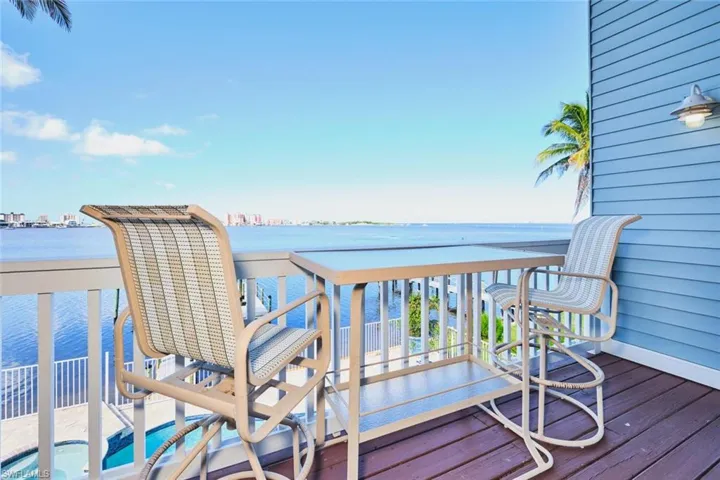 Main living area -  Wooden terrace with a water view
