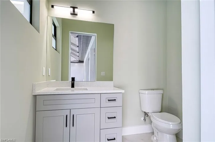 Bathroom accessible from the Lanai/Pool Deck