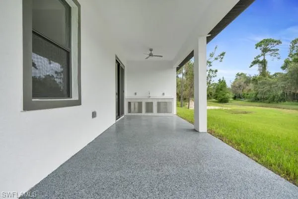 View of patio / terrace featuring ceiling fan