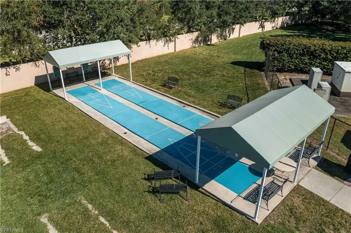 View of pool with shuffleboard