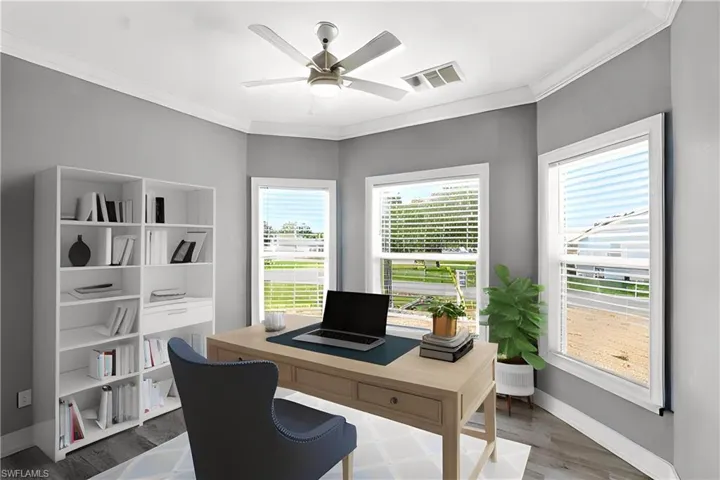 Front room with beautiful bay windows can be used as an office or a bedroom with a full closet.