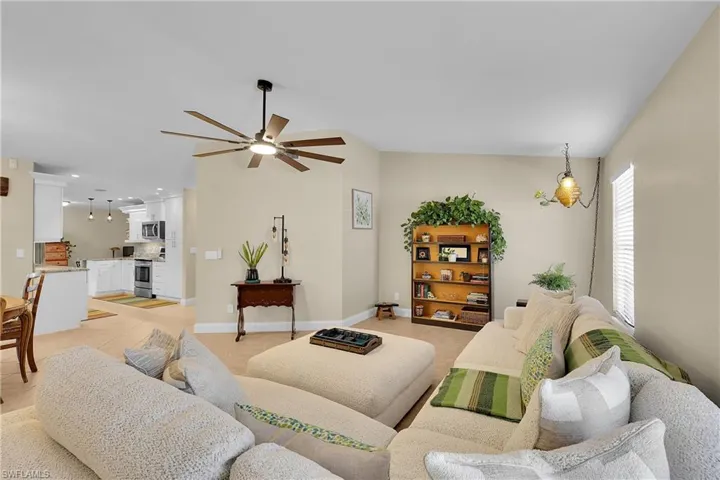 Bedroom featuring a closet, wood finished floors, and ceiling fan
