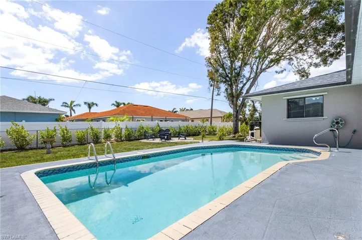 View of pool featuring a fenced in pool, fence, and a patio