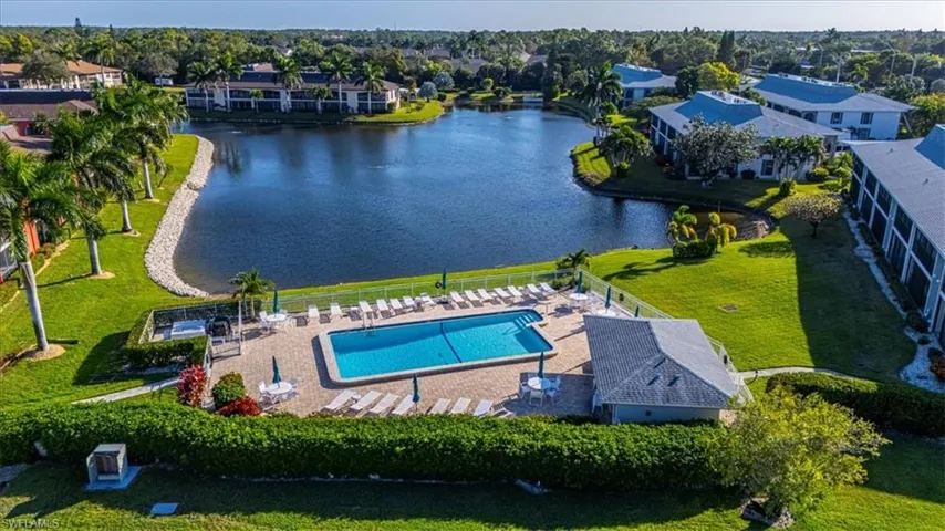 Aerial view of a nearby body of water and a pool