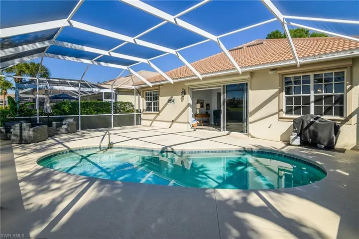 Large lanai for entertaining...electric hurricane protection covers window and slider openings.