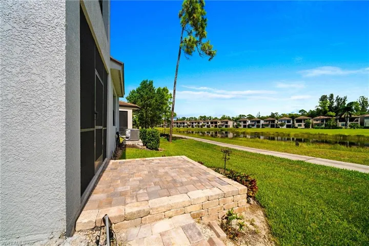 View of patio / terrace featuring a water view and a residential view