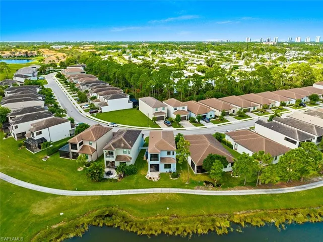 Aerial view of residential area with a nearby body of water