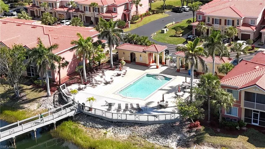 Aerial view with a residential view and a water view