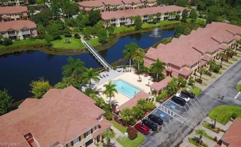 Bird's eye view featuring a water view and a residential view