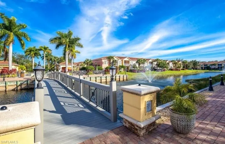 Dock area featuring a water view and a residential view