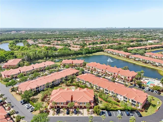 Aerial view featuring a residential view and a water view