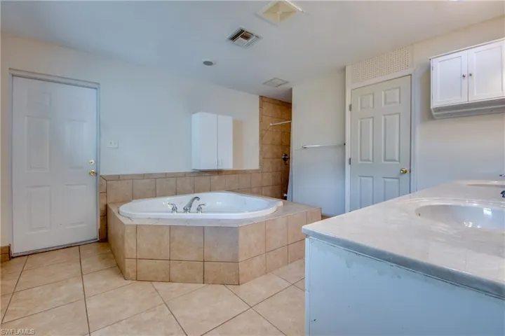 Luxury Bathroom with Jetted Tub, Walk-In Shower, Doubly Sink Vanity