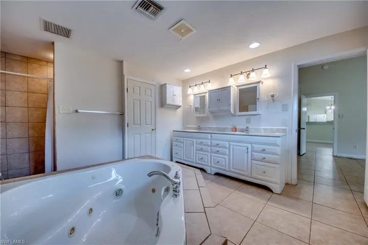 Luxury Bathroom with Jetted Tub, Walk-In Shower, Doubly Sink Vanity