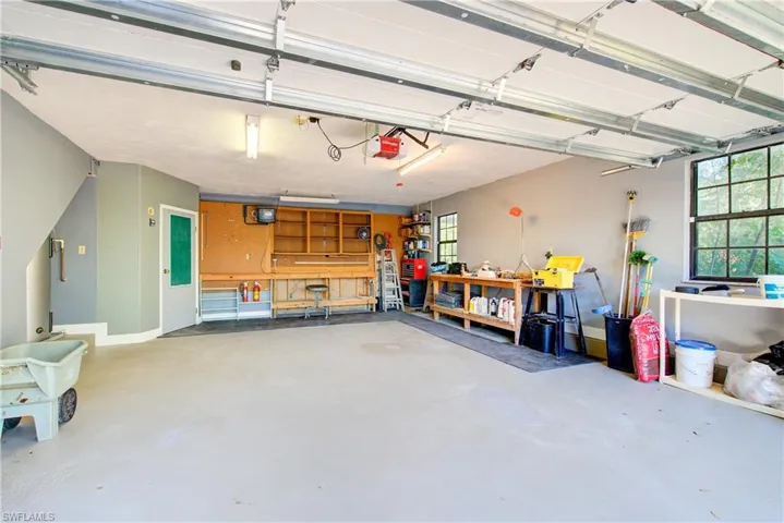 Garage featuring a workshop area