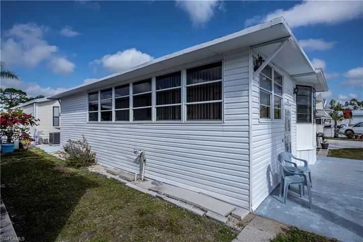 View of property exterior featuring central AC